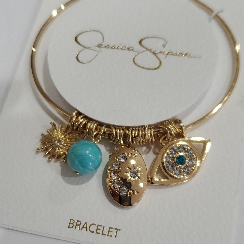 Jessica Simpson gold tone celestial theme crystal studded charm‎ bracelet new